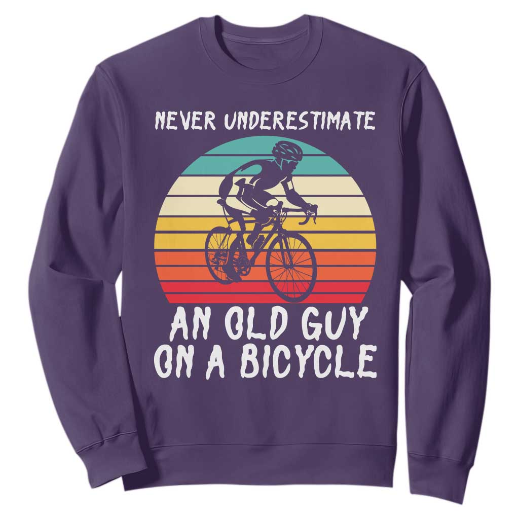 Never Underestimate An Old Guy On A Bicycle Sweatshirt Cycling Lover Gift TS12 Purple Print Your Wear