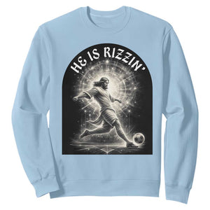 He Is Rizzin Sweatshirt Funny Christian Faith Soccer Player Gift TS12 Light Blue Print Your Wear
