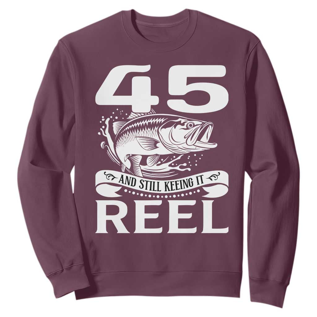 Still Keeping It Reel At 45 Sweatshirt Fisherman Birthday Gift TS12 Maroon Print Your Wear