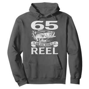 Still Keeping It Reel At 65 Hoodie Fisherman Birthday Gift TS12 Dark Heather Print Your Wear