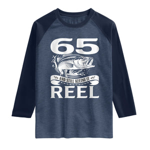 Still Keeping It Reel At 65 Raglan Shirt Fisherman Birthday Gift TS12 Heather Denim Navy Print Your Wear