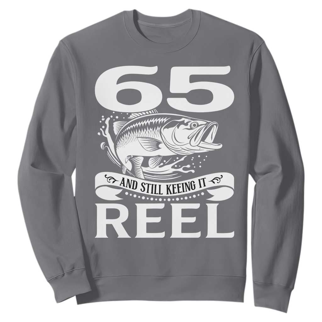 Still Keeping It Reel At 65 Sweatshirt Fisherman Birthday Gift TS12 Charcoal Print Your Wear