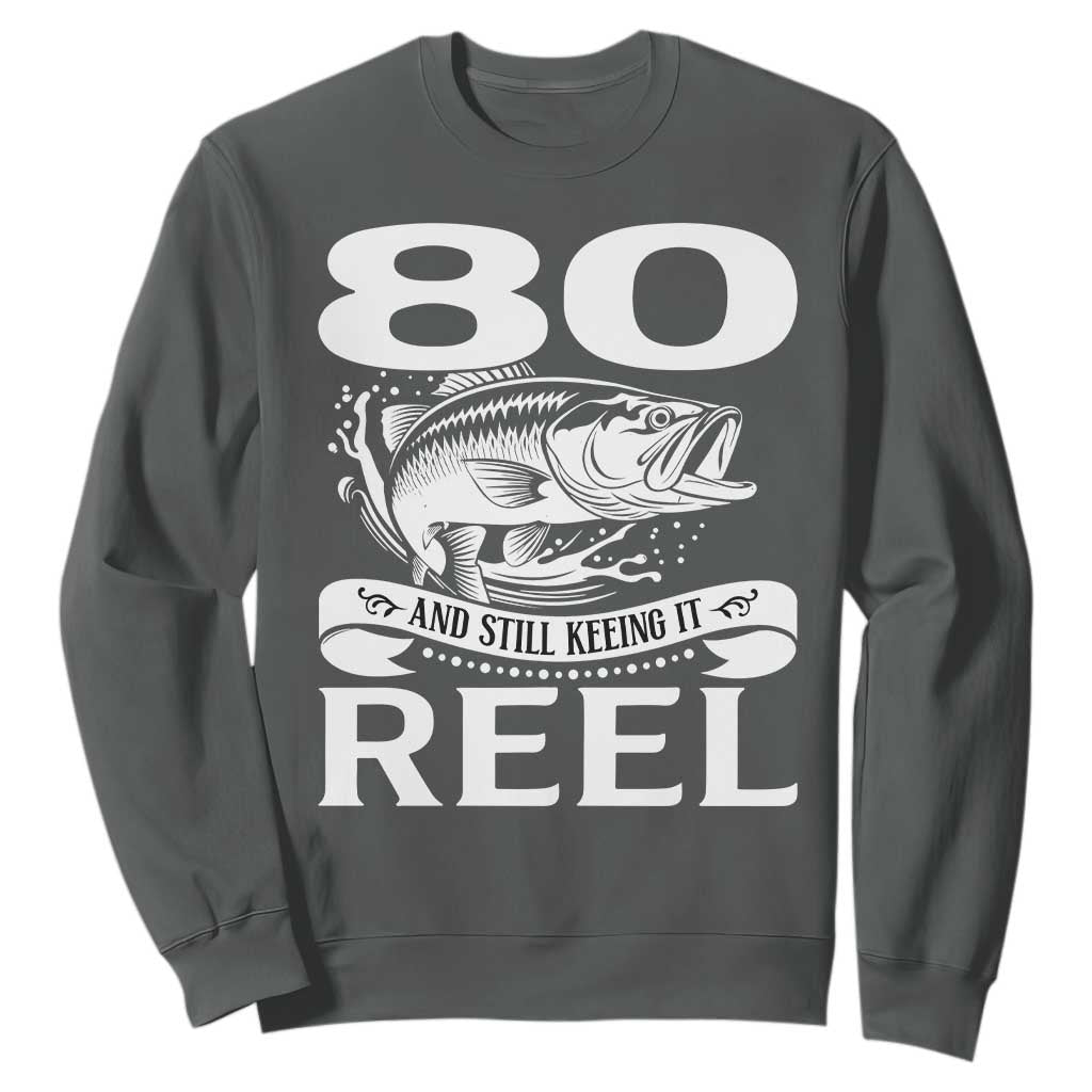 Still Keeping It Reel At 80 Sweatshirt Fisherman Birthday Gift TS12 Dark Heather Print Your Wear