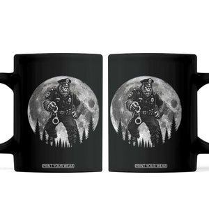 Funny Bigfoot Police Coffee Mug Handcuffing Sasquatch Under The Full Moon