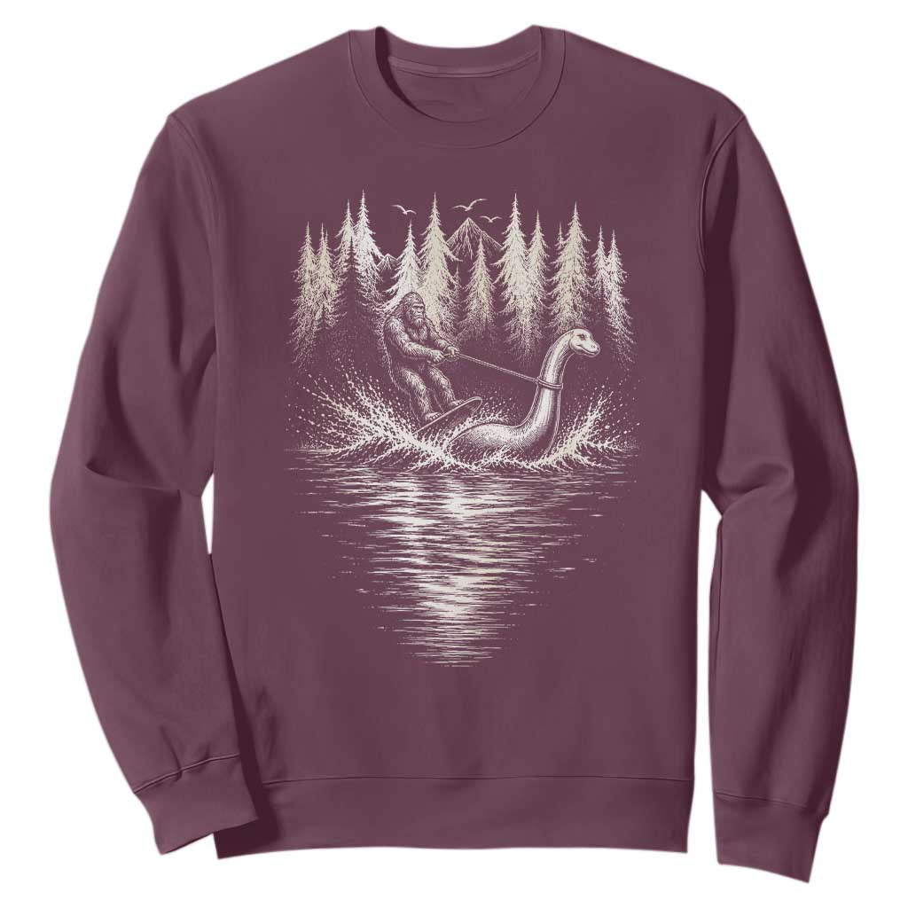 Funny Bigfoot Water Skiing Behind Nessie Sweatshirt Cryptid Lover TS12 Maroon Print Your Wear