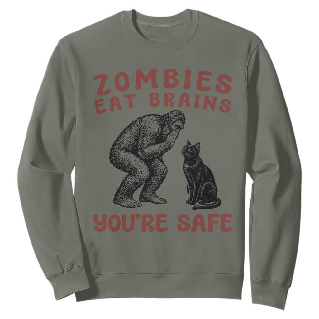 Funny Bigfoot And Black Cat Sweatshirt Zombies Eat Brains Dont Worry You Are Safe TS12 Military Green Print Your Wear