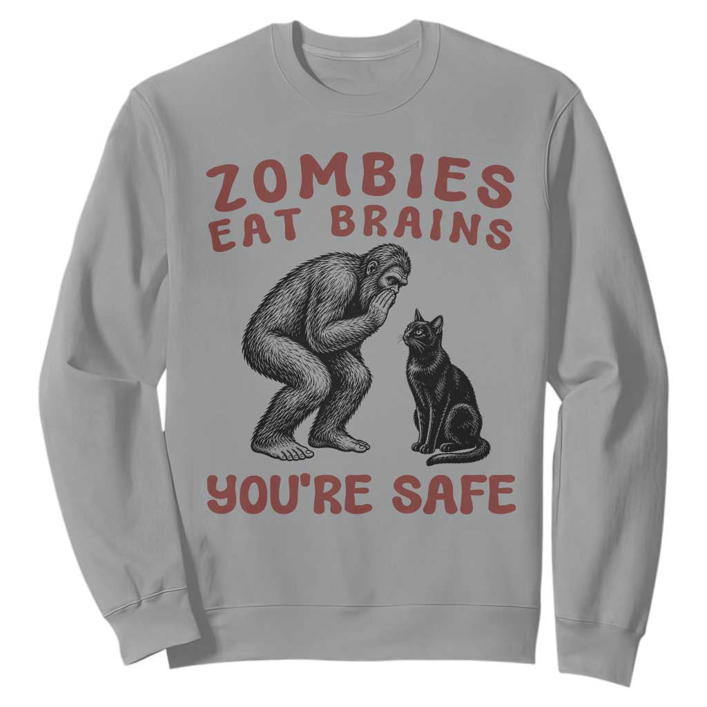 Funny Bigfoot And Black Cat Sweatshirt Zombies Eat Brains Dont Worry You Are Safe TS12 Sport Gray Print Your Wear