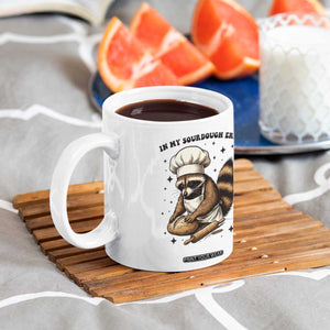 In My Sourdough Era Coffee Mug Funny Raccoon Baker TS14 Print Your Wear