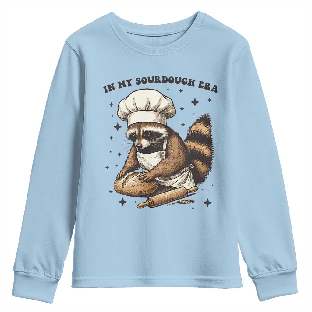 In My Sourdough Era Youth Sweatshirt Funny Raccoon Baker TS14 Light Blue Print Your Wear