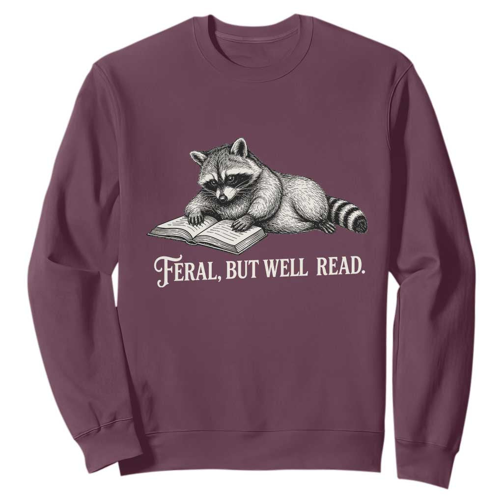 Feral But Well Read Sweatshirt Funny Raccoon Reading Book Lover TS14 Maroon Print Your Wear