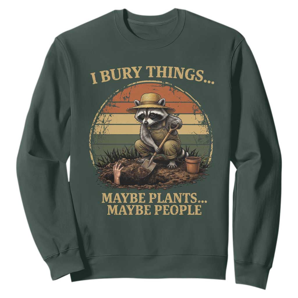I Bury Things Maybe Plants Maybe People Sweatshirt Funny Gardening Raccoon Meme TS14 Dark Forest Green Print Your Wear