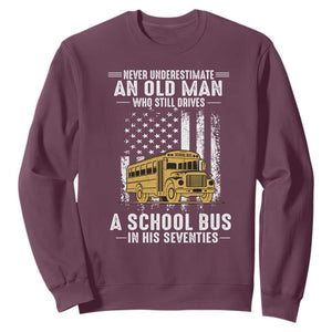 Funny School Bus Driver Sweatshirt Never Underestimate an Old Man Who Still Drives A School Bus TS14 Maroon Print Your Wear