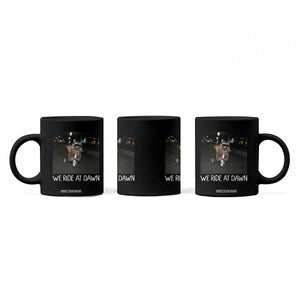 We Ride at Dawn Coffee Mug Funny Racoon Riding Tricycle Chaotic Meme TS14 Print Your Wear