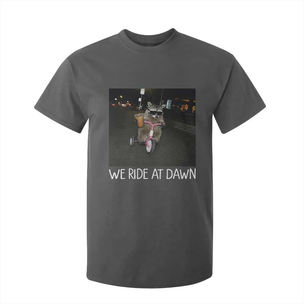 We Ride at Dawn T Shirt For Kid Funny Racoon Riding Tricycle Chaotic Meme TS14 Dark Heather Print Your Wear