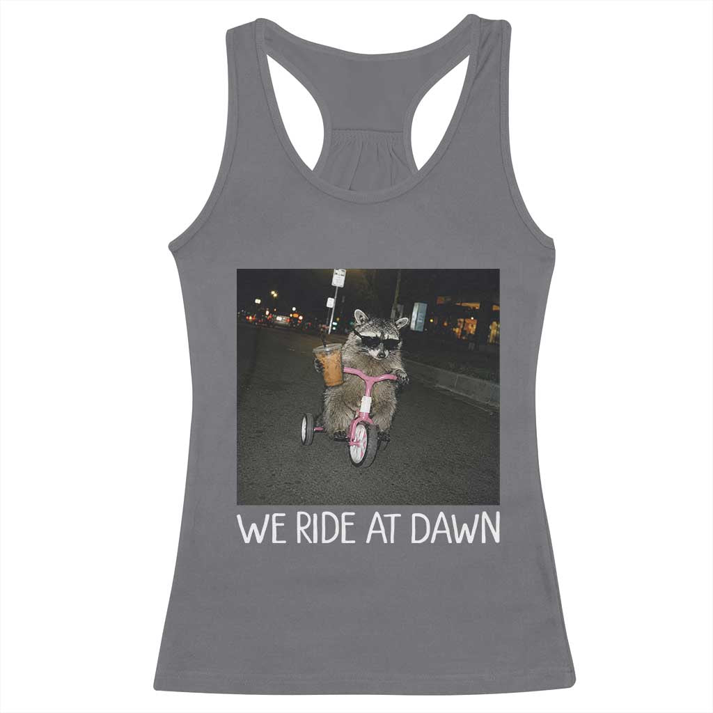 We Ride at Dawn Racerback Tank Top Funny Racoon Riding Tricycle Chaotic Meme TS14 Charcoal Print Your Wear