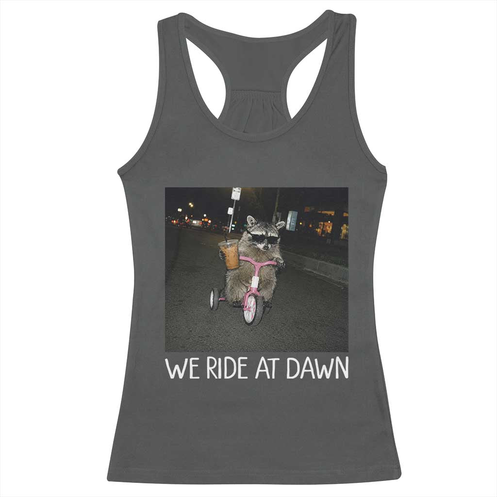 We Ride at Dawn Racerback Tank Top Funny Racoon Riding Tricycle Chaotic Meme TS14 Dark Heather Print Your Wear