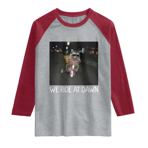 We Ride at Dawn Raglan Shirt Funny Racoon Riding Tricycle Chaotic Meme TS14 Heather Gray Heather Red Print Your Wear