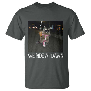 We Ride at Dawn T Shirt Funny Racoon Riding Tricycle Chaotic Meme TS14 Dark Heather Print Your Wear