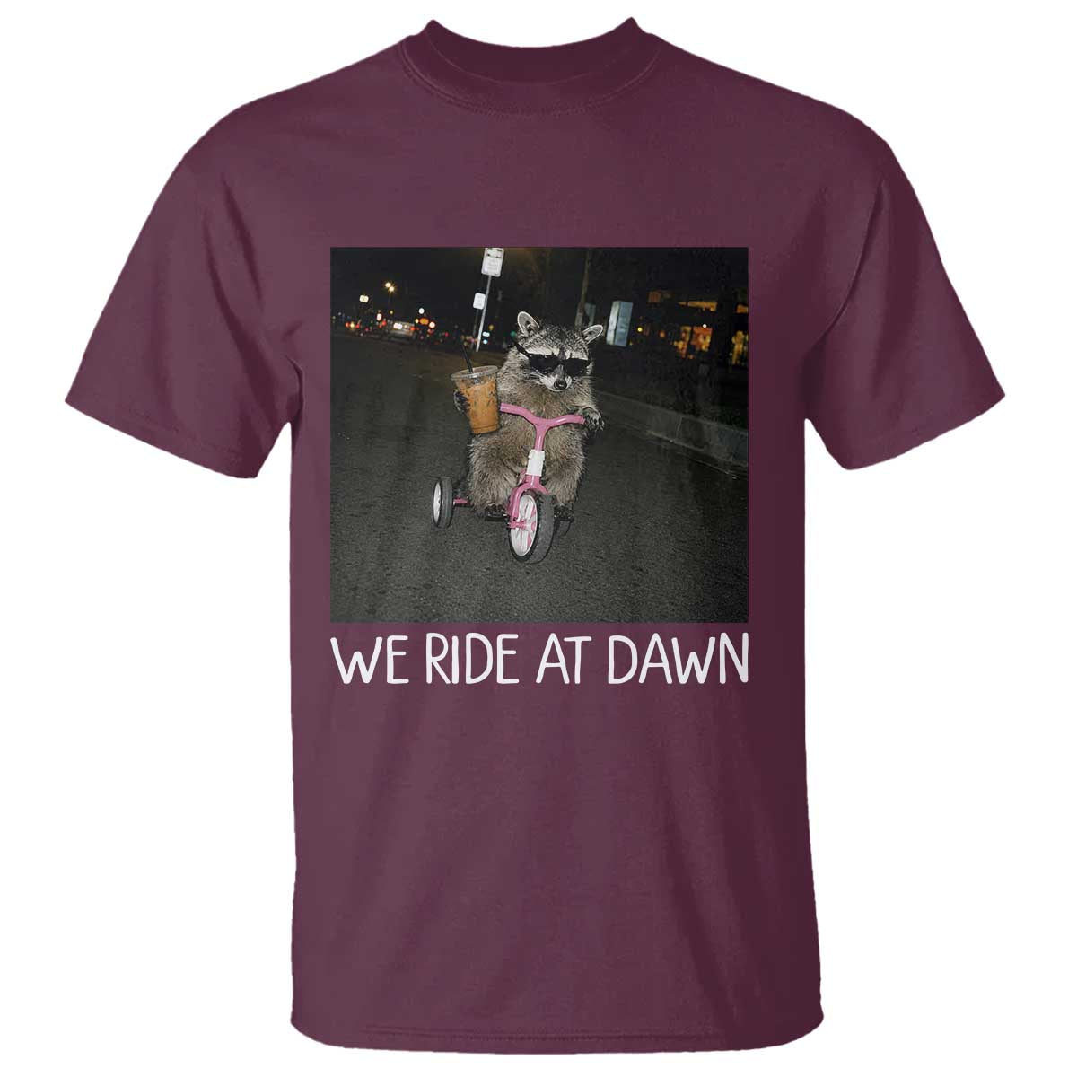 We Ride at Dawn T Shirt Funny Racoon Riding Tricycle Chaotic Meme TS14 Maroon Print Your Wear