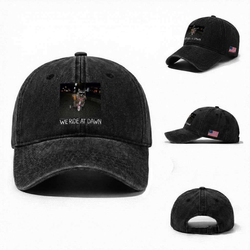 We Ride at Dawn Washed Cotton Baseball Cap Funny Racoon Riding Tricycle Chaotic Meme TS14 Washed Cap Universal Fit Black Print Your Wear
