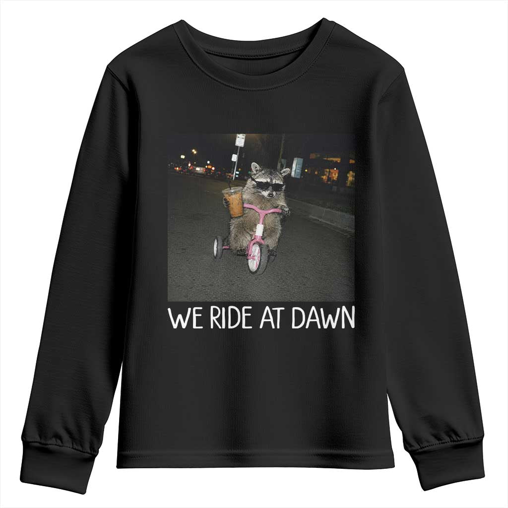 We Ride at Dawn Youth Sweatshirt Funny Racoon Riding Tricycle Chaotic Meme TS14 Black Print Your Wear