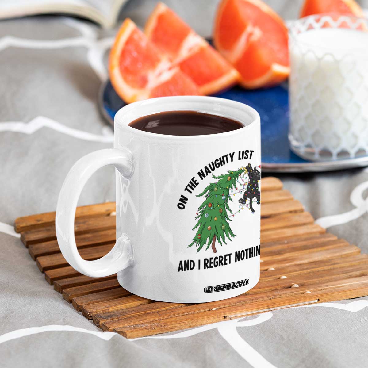 Funny Black Cat Christmas Coffee Mug On the Naughty List And I Regret Nothing TS14 Print Your Wear