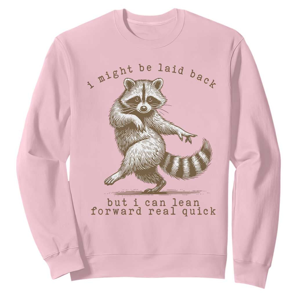 Funny Raccoon Sarcastic Sweatshirt I Might Be Laid Back But I Can Lean Forward Real Quick TS14 Light Pink Print Your Wear