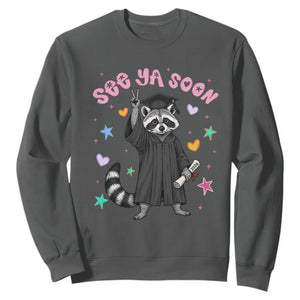 See Ya Soon Raccoon Sweatshirt Funny Raccoon Graduation 2026 TS14 Dark Heather Print Your Wear